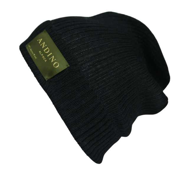 Black alpaca wool beanie hat from the side on a white background