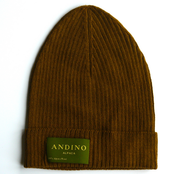 Brown alpaca wool beanie hat on a white background.