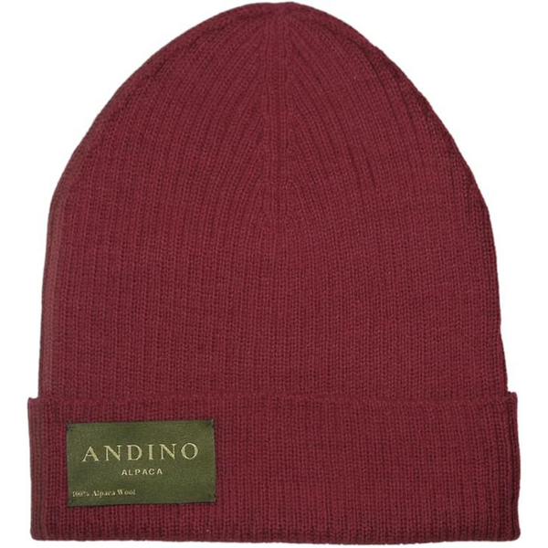 Burgundy alpaca wool beanie hat on a white background.