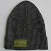 Dark grey alpaca wool beanie hat on a white background