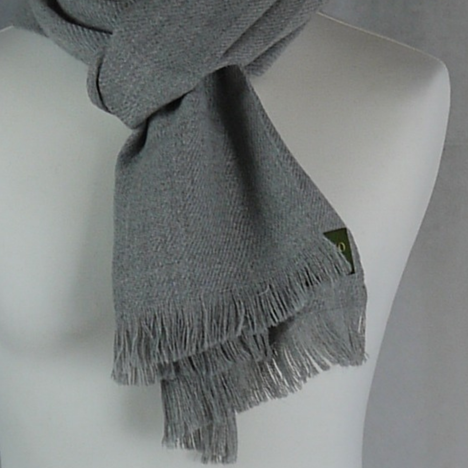 Light grey large alpaca wool scarf shawl on a model doll.