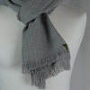 Light grey large alpaca wool scarf shawl on a model doll.
