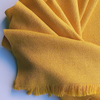 Mustard alpaca wool scarf large shawl & folded on white background with Andino Alpaca logo print.