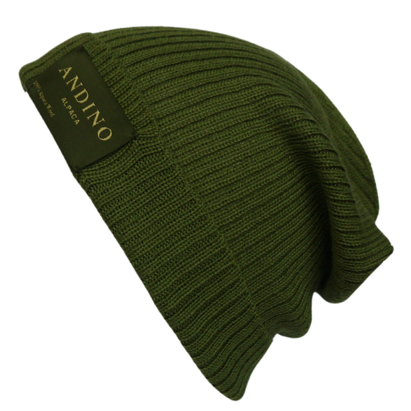 Navy blue alpaca wool beanie hat from the side on a white background.