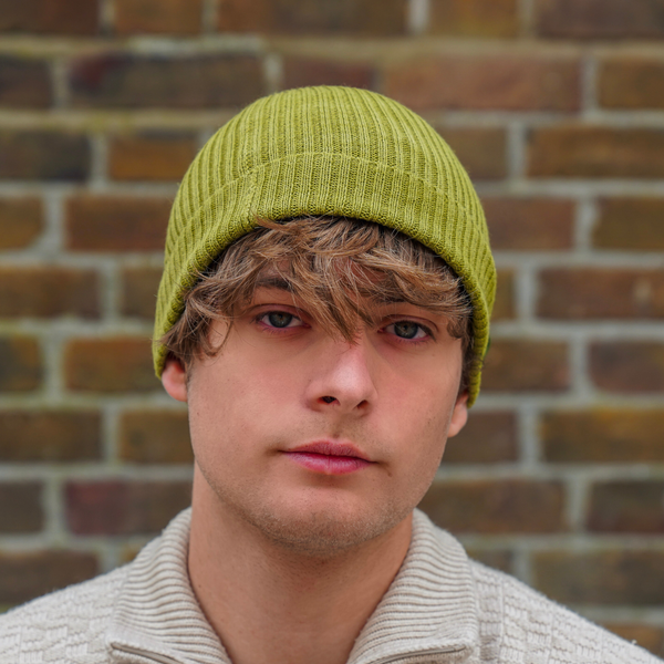 Olive Green alpaca wool beanie hat on a white background.