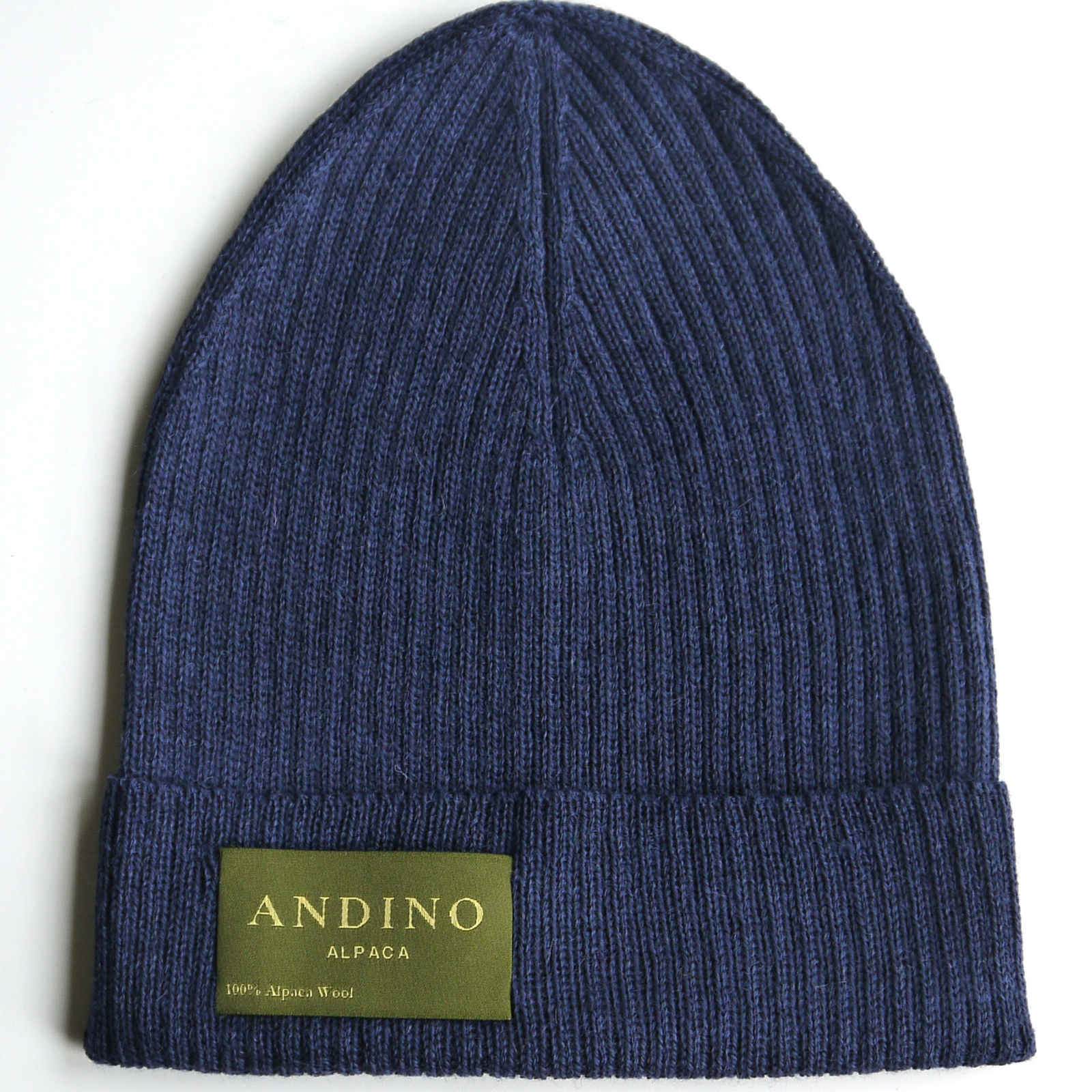 Pink alpaca wool beanie hat on a white background